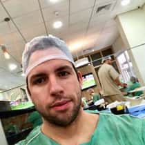 Dr Neville Adriano