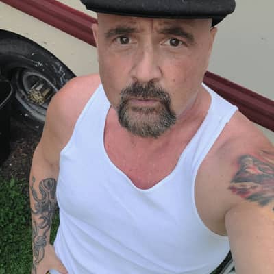 E John Baldasarre